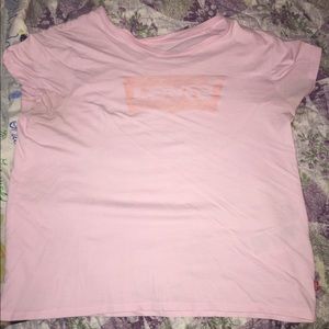 Levi’s pink t-shirt.